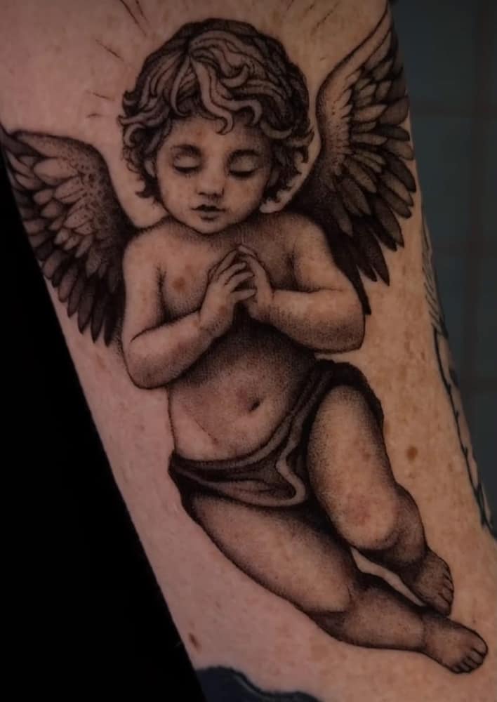 Praying cherub angel tattoo